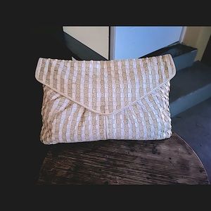 Tan and cream 100% leather clutch